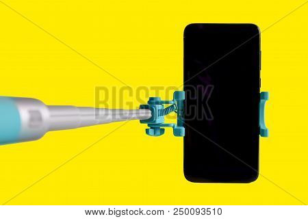 Monopod For Selfie With Smart Phone. Selfie Stick With Smartphone Isolated On White Background.