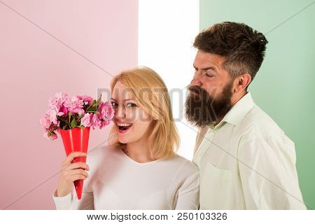 Woman Enjoy Fragrance Bouquet Flowers. Man With Beard Takes Care About Girlfriend Happiness. Lady Li