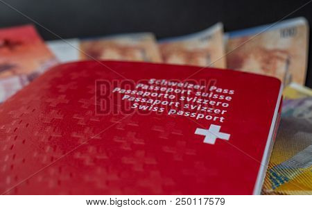 Swiss Passport And Money Close Up On Black Background Switzerland Citizenship And Currency
