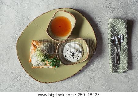 Flat Lay With Samosas In Phyllo Dough Stuffed With Spinach And Paneer Decorated With Germinated Seed