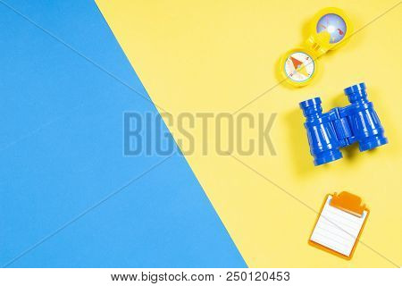 Kids Toys Background. Toy Tourist Equipment On Colorful Background
