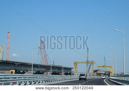 Crimean Bridge, Taman, Russia - July 9, 2018: Driving Along The Crimean Bridge. A Grandiose Building