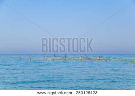 Fishing Nets Set In The Sea. Fishing Nets.