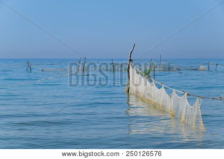 Fishing Nets Set In The Sea. Fishing Nets.