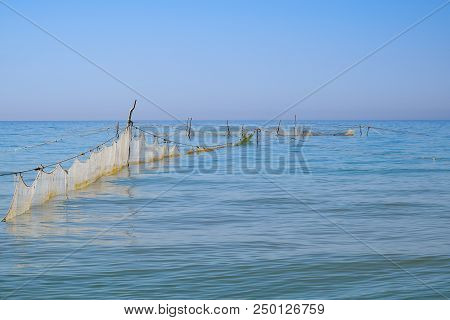 Fishing Nets Set In The Sea. Fishing Nets.