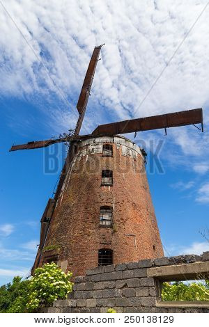Zdrzewno, Poland- 08 June 2014: Dutch Windmill From 1765. From The Fourteenth Century Belonged To Th