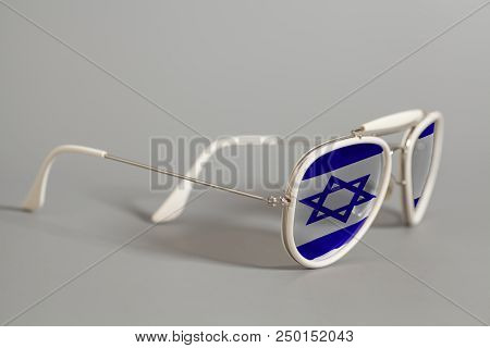White Sunglasses With Flag Of Israel On Gray Background
