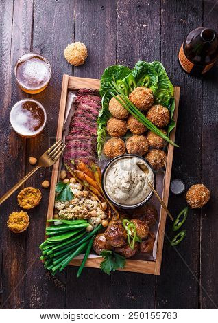Assorted Middle Eastern Dishes: Falafel, Meat, Potato Cauliflower And Babaghanoush