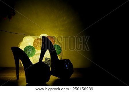 Background, Closeup View Highheel Shoes With Romantic Luminaire