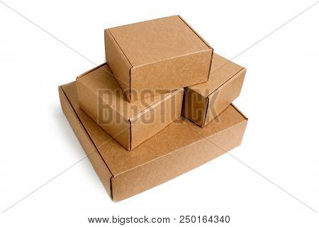 Delivery, Moving, Package And Gifts Concept - Pile Of Stacked Self-gathering Cardboard Boxes Isolate