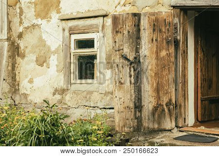 Wall Of An Old Farm Building. Natural Vintage Texture. Specially Preserved Rural Wooden House For Ag