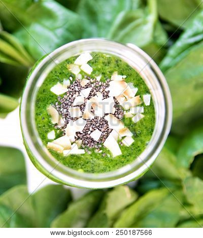 Green Smoothie In Jar, Overhead On Glass, Healthy Drink With Vegetable Leaves, Background