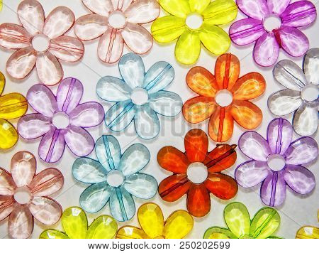 Colored Glass Transparent Flowers In A Colored Background On White
