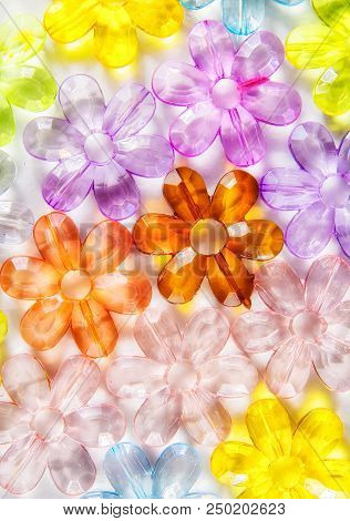Colored Glass Transparent Flowers In A Colored Background On White