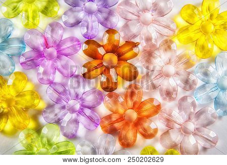 Colored Glass Transparent Flowers In A Colored Background On White