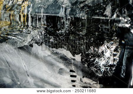 Texture Of A Big Clear Ornate Ice Cube With The Small Veinlets Inside It For A Beautiful Background