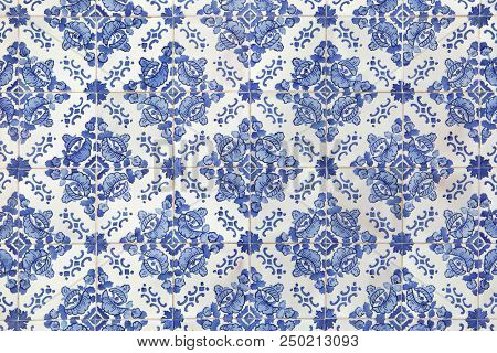 Traditional Portuguese azulejo tiles on the building in Porto, Portugal. Background texture. 