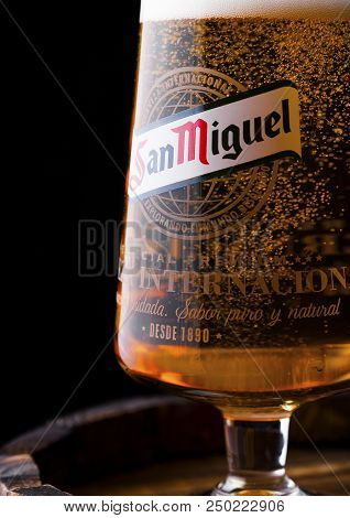 London, Uk - April 27, 2018: Original Glass Of San Miguel Lager Beer On Dark Wooden Background. The 