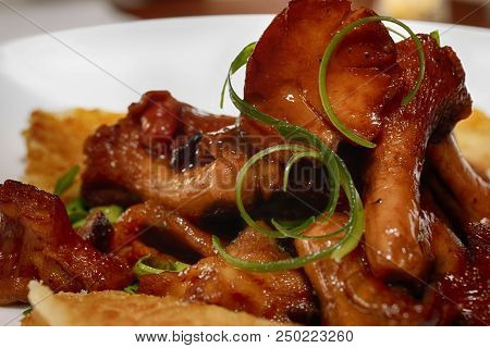 Fried Chanterelle Mushrooms With Fried Bread And Young Onion -delicatesse - Close Up