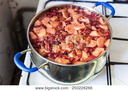 Local Non-alcoholic Sweet Beverage Kompot (compote) From Fresh Apricot Fruits, Raspberries, Cherries