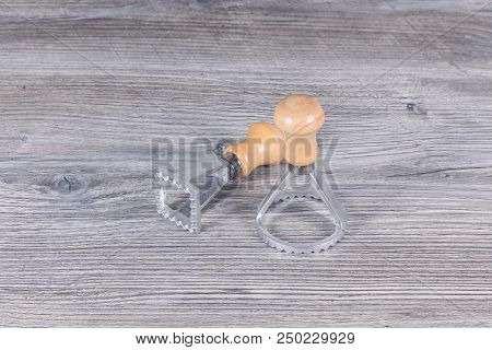 Cookie Cutter On An Antracyte Gray Wooden Board