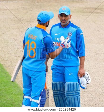 LEEDS, ENGLAND - JULY 17: Virat Kohli, and MS Dhoni  during the 3rd Royal London One day International match between England and India at Headingley Cricket Ground on July 17, 2018 in  England.  