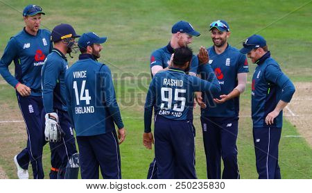 LEEDS, ENGLAND - JULY 17: Adil Rashid celebrates taking the wicket of Virat Kohli during the 3rd Royal London One day International match between England and India at Headingley Cricket Ground