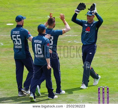 LEEDS, ENGLAND - JULY 17: Mark Wood celebrates taking a wicket during the 3rd Royal London One day International match between England and India at Headingley Cricket Ground on July 17, 2018