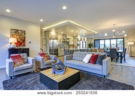 White And Gray Living Room Interior With Open Floor Plan.