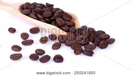 Coffee Bean In Wooden Spoon On White Background