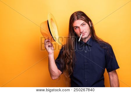 Smoking Man Gretting To The Camera While Taking Off His Hat