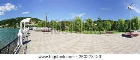 Panoramic View Of The Embankment With A Summer Stage On The Shore Of The Picturesque Lake Abrau In T