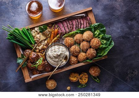 Middle Eastern Party Food: Falafel, Babaghanoush, Potatoes Beef Green Veggies