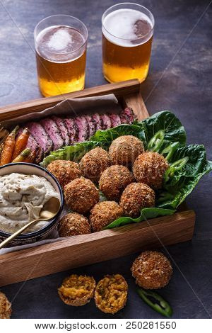 Falafel Balls On A Romano Leafs In A Wooden Box.