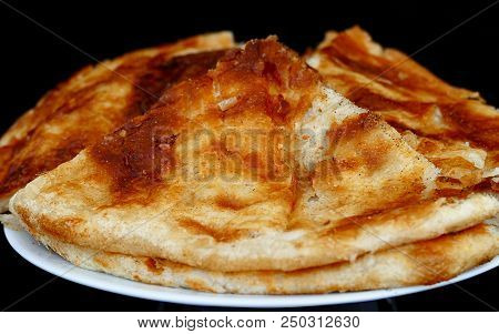 Yozgat Turkey Fat Bread, On A Black Background,
