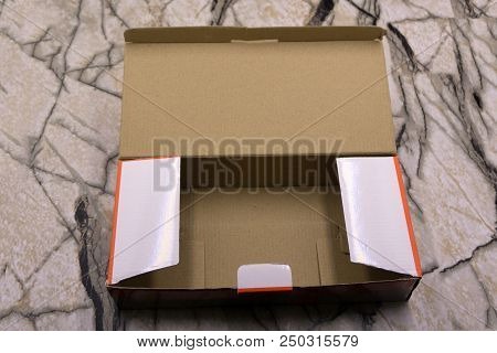 Open Empty Cardboard Box Isolated On White Background