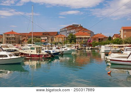 Sunny Mediterranean Landscape With Fishing Boats In Harbor. Montenegro, Tivat City, View Of Marina K