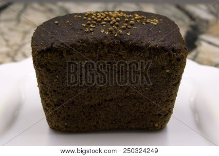Russian Bread, Rye-wheat, Darnitsky On A Light Background