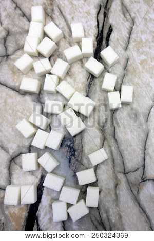 White Sugar On Marble Table Space Spoon