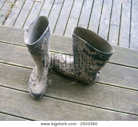 Buty błotniste pracy na ganku