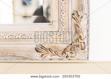 Closeup On A Piece Of Vintage Wooden Frame Of Mirror