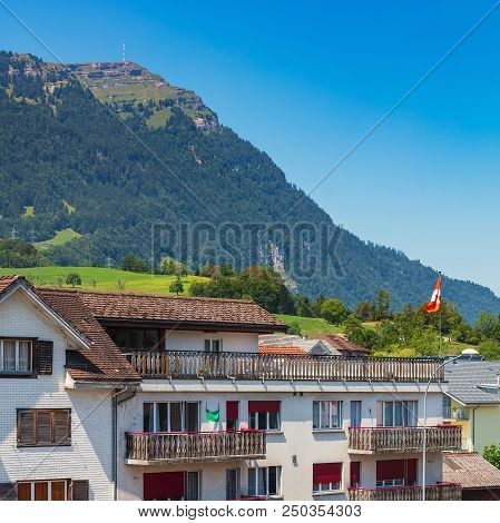 Goldau, Switzerland - July 19, 2018: View In The Town Of Goldau, Summit Of Mt. Rigi In The Backgroun