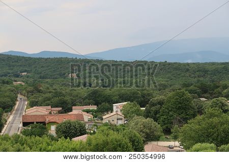 Photography Showing A The Village Of Grignan And Its Surrounding Area. The Photography Was Taken Fro