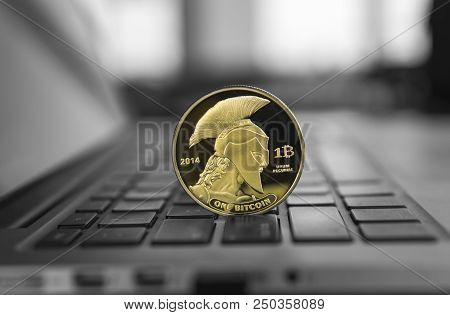 Titan Bitcoin Coin Symbol On Laptop. Concept Financial Currency, Crypto Currency Sign. Blockchain Mi