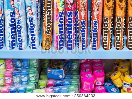 Amsterdam, Netherlands - July 18, 2018: Wide Range Of Mentos Stick Candy On The Shelf In Duty Free A