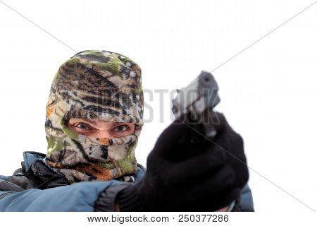 Masked Killer With Handgun Over White Background