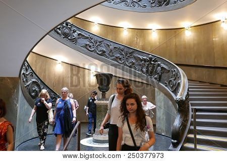 Vatican, Vatican City - 14 July 2018: People Under The Modern Spiral Stairs Of The Vatican Museums, 