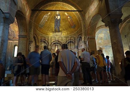 Trieste, Italy - 7 July 2018: People In The Chapel Dedicated To Saint Justus, San Giusto Basilica Ro
