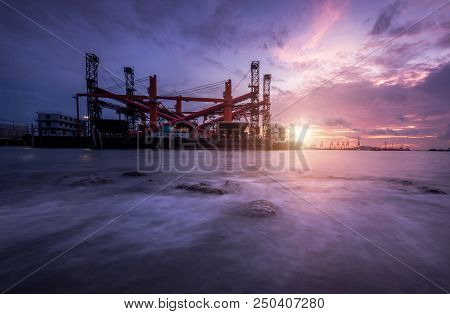 Cargo Ship In The Harbor At Sunset.twilight Sea.ship Industrial.purple Cloud