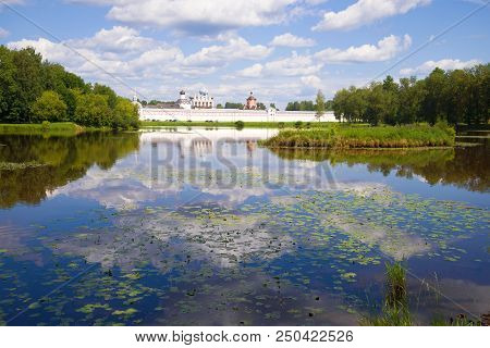 Landscape Of Tabory Lake With The Tikhvin Bogorodichny Uspensky Monastery On A Sunny July Day. Tikhv